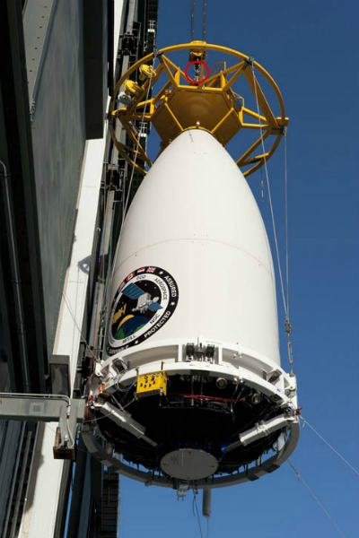 Capsule lifted outside the vehicle assembly building